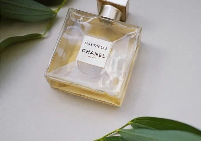 A bottle of the product lying on a table.